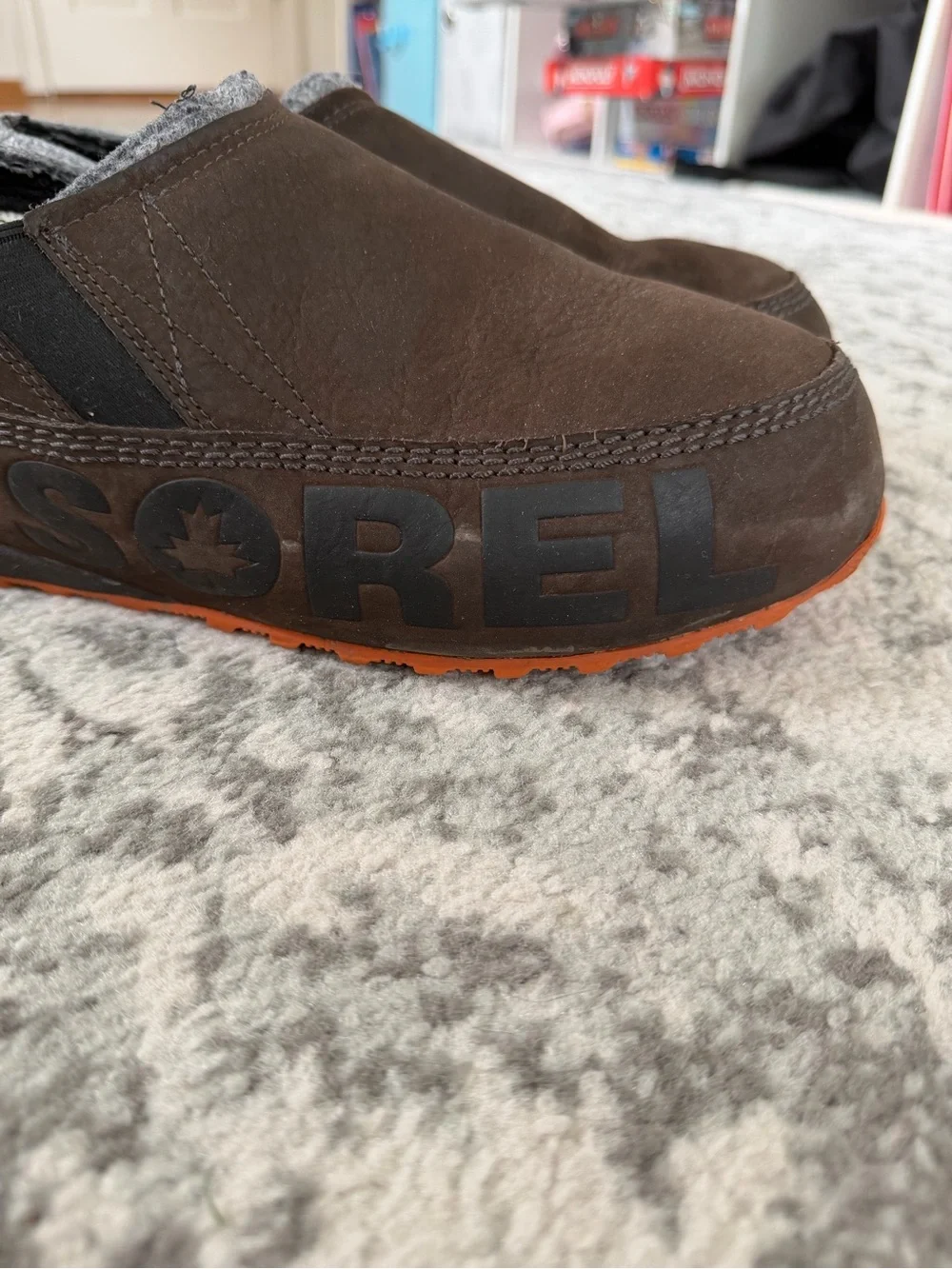 Sorel Brown Slip-On Snow Clog with Orange Sole